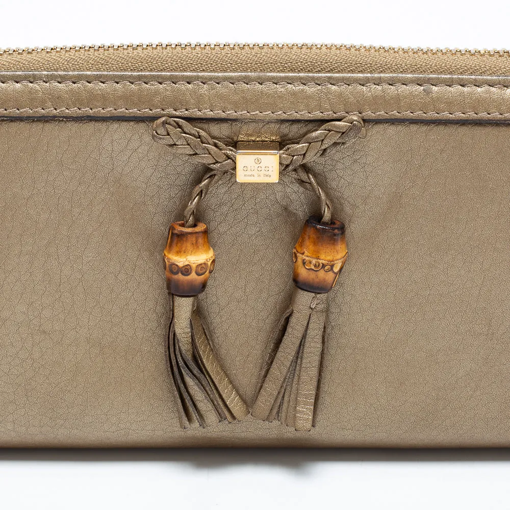 Gucci Gold Leather Bamboo Tassel Bow Zip Around Wallet